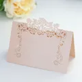 Pale pink glitter laser-cut tent place card with hollow flower and heart designs - Jade Pearl