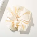 Elegant cream satin hair scrunchie with silky finish for women's hair styling - Creamy White - Luminous Satin