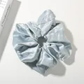 Elegant light blue satin scrunchie with premium glossy finish and pleated texture - Light Blue - Luminous Satin
