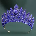 Detailed close-up of golden crown with blue crystals and radiant rhinestone pattern - KC Gold Royal Blue Crystal