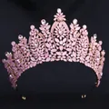 Macro detail of golden tiara with pink stones and sparkling crystals on black background - KC Gold Tone With Pink Jelly Rhinestone