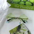 Occhiali da sole a nuvola verde chiaro senza montatura con perle e montatura oro - Forma a Nuvola Verde Chiaro Senza Montatura con Pendenti (Verde 7)