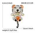 Spilla tigre dorata con strass bianchi e smalto arancione, altezza 6,2 cm circa - Arancione