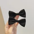 Pair of elegant black velvet bow hair clips with smooth satin finish for women - Large Satin Black