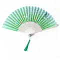 Mint green bamboo folding fan with white floral patterns and green silk tassel - White Ribs Style 13