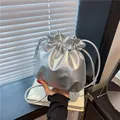 Metallic silver drawstring bucket bag with cloud pleats and thin shoulder strap - Silver