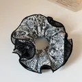 Elastico per capelli chic a pois bianchi e neri con bordo in rete a strati e tessuto - Stampa Floreale Crema