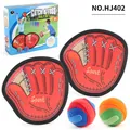Vangspelset voor kinderen met twee rode paddles en twee kleurrijke kleverige ballen - Set Batjes En Plakballen (HJ402)
