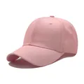 Classic pink cotton baseball cap with structured panels and curved brim for sun protection - Pink