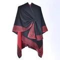 Black and red reversible knit poncho cape with Greek key pattern and wrap closure - Black Red Geometric Meander