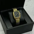 Vintage tonneau quartz watch with gold stretch band and black dial in a gift box - Women's Black Dial / Gold