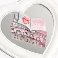Creative book shaped hair claw with Libraries are for Everyone slogan design - Book