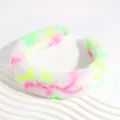 Fuzzy leopard print headband with vibrant neon pink and yellow spots on white plush - White