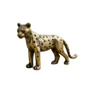 Dettaglio macro della statua di leopardo in ottone con texture vintage e macchie nere - Leopardo in piedi