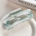 Elegant acrylic hair claw clip with grey marble pattern in a rectangular hollow design - Smoky Cyan