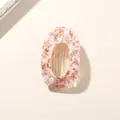 Pink marble acetate hair clip with oval hollow design and gold metal inner structure - Red Marble