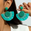 Bohemian teal raffia fan earrings featuring woven fiber petals and beaded center - Teal Raffia with Beaded Fan (31528-ear-green-EP)