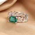 Vintage silver chain ring featuring a large emerald-cut green zircon on silk fabric - US 6 / Platinum Green