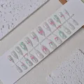 Press-on nails with cute cherry and green plaid patterns in soft white and pink - WY-055 / 10 Pieces In Xs Size