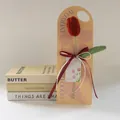 Handmade red crochet tulip with yellow carry card and Mother's Day greeting card - Closed Red Tulip
