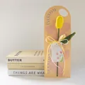 Handmade crochet yellow tulip flower with Mother's Day gift card and ribbon bow - Closed Yellow Tulip