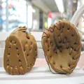 Brown mini baseball glove keychain set with leather stitching on a white bench - 3.8CM Khaki Glove Accessory