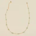 Bohemian style necklace with pale green flower beads and golden metal spheres - Grape Green Necklace