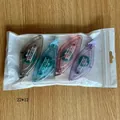 Set of four color adhesive dot tape rollers in a clear portable zipper bag - Long Wide Dot Glue Tape (0120) / Mixed Colors