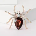 Exquisite rose gold spider brooch with red teardrop crystal and white rhinestones - Gold and Purple Spider Style
