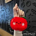Cute red apple plush keychain with cartoon face and silver chain for bags - Apple