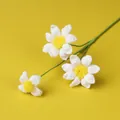 Handmade crochet white daisy flower bouquet with three blossoms on green stem - Blue-Eyed Daisy Branch - White