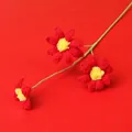 Handmade crochet red rose bouquet with green stem and yellow centers on red background - Blue-Eyed Daisy Branch - Red