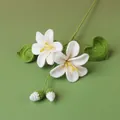 Handmade crochet white lily bouquet with yellow stamens and green leaves variant - Xue Wu Tung Flower Branch - White