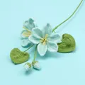 Handmade crochet rose bouquet in light blue yarn for home decor and unique gifting - Xue Wu Tung Flower Branch - Blue
