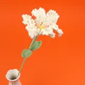 Handmade crochet white lily bouquet with green leaves on bright orange background - Crape Myrtle Branch - White