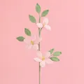 Handmade crochet bouquet with three pink roses and green leaves on a soft pink background - Star Jasmine Branch - Light Pink