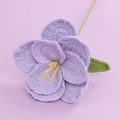 Handmade purple knitted lily flower with yellow core and green stem on lilac backdrop - Platycodon Branch - Purple