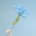 Handmade light blue crochet rose flower bouquet in white ceramic vase on blue background - Crape Myrtle Branch - Blue