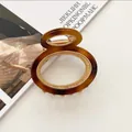 Pinza para el cabello vintage de acetato de carey con marco de metal dorado - Carey Ámbar