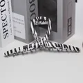 Grande pince à cheveux en acrylique avec motif zébré noir et blanc et design croisé - Pince à cheveux croisée motif zèbre / Noir+Blanc