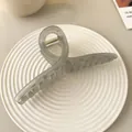 Pince à cheveux élégante en acrylique gris translucide avec ressort doré - Épingle à cheveux en U / Gris Transparent