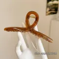 Grande pince à cheveux ambre translucide au design torsadé, taille environ 13cm - Épingle à cheveux en U / 13cm / Brun Transparent