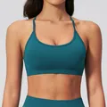 Seamless ribbed sports bra in dark teal with thin straps and wide supportive band - Soft Emerald Green