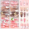 Pink press-on nail set featuring 3D bears, pearls, and bows in a clear storage box - 3D Decorated Nail Tips (TD365-S1)