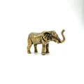 Macro view of vintage bronze elephant statue showing detailed skin texture and trunk - Thai Elephant Ornament / Bronze