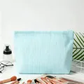 Blue and white seersucker striped cosmetic bag for travel and daily organizing - Lake Blue