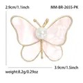 Detalle del broche de mariposa vintage que muestra tamaño 3,9x2,9cm y peso de 8,2g - Rosa Dorado