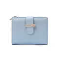 Detail of light blue cross-textured wallet with a gold bow buckle and zip closure - Sky Blue