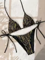 Two-piece black and gold tiger print bikini set with halter top and side-tie bottom - Brown Zebra Print