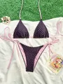 Pink polka dot two-piece bikini set with halter top and side-tie triangle bottoms - Coffee Base Pink Polka Dot